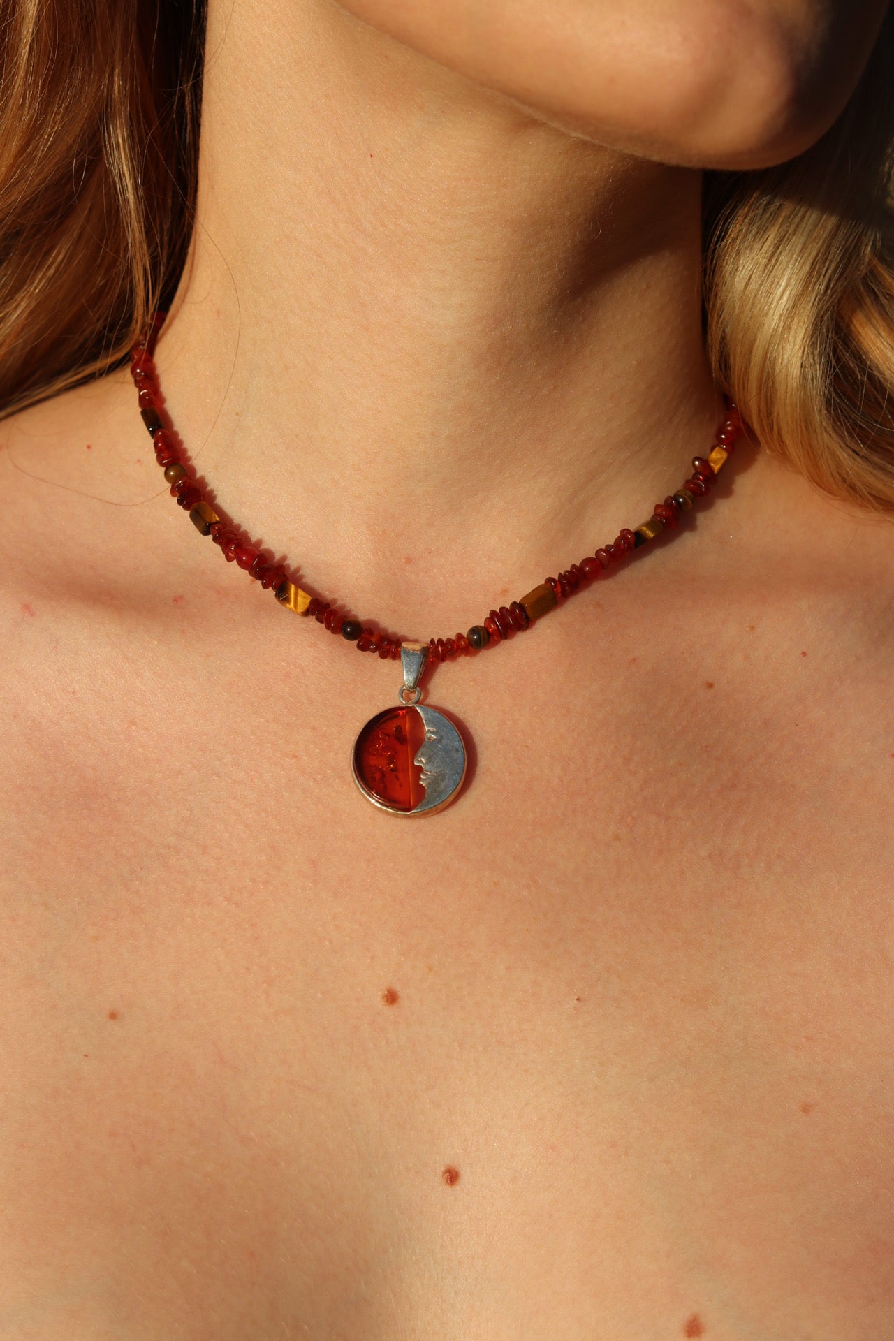 Amber crescent moon pendant