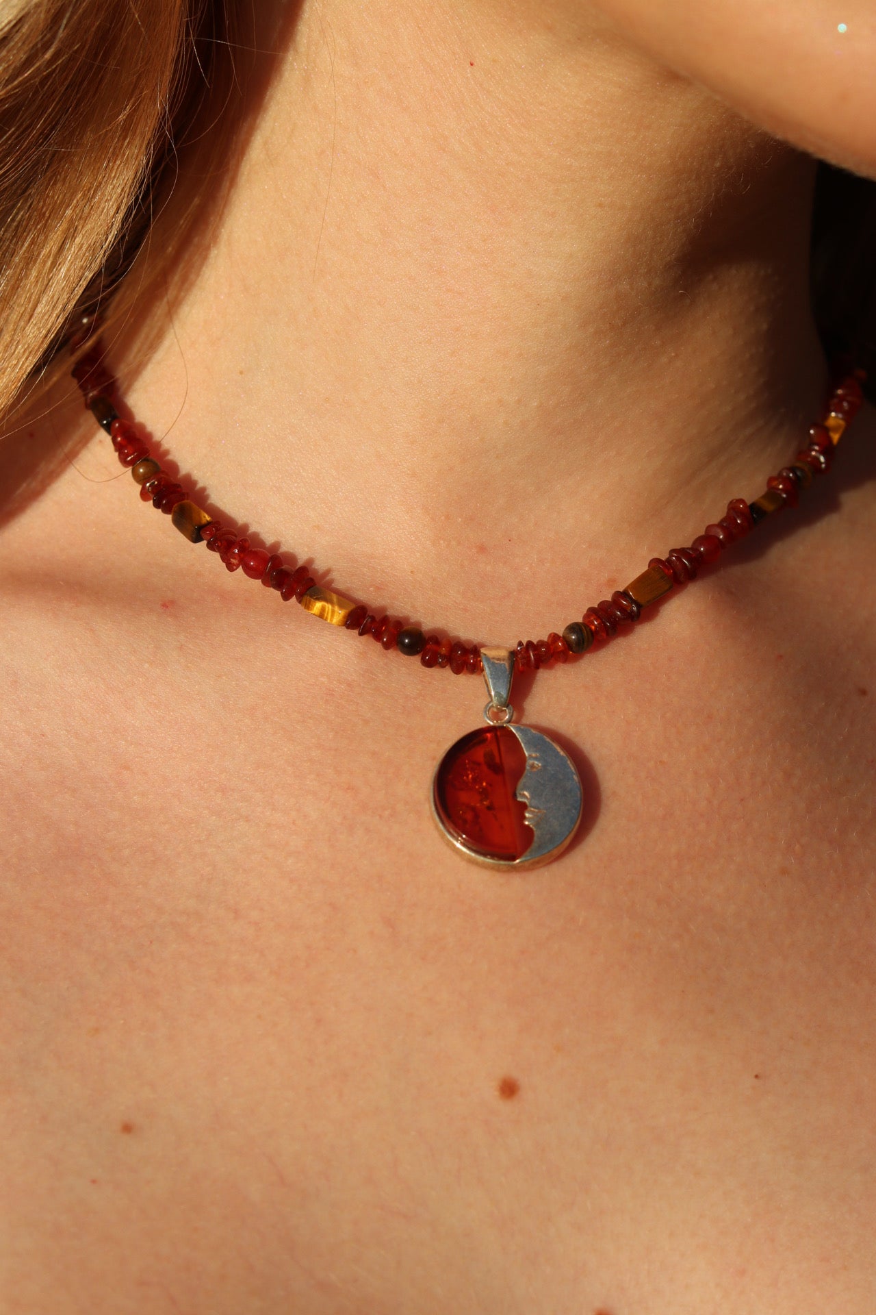 Amber crescent moon pendant