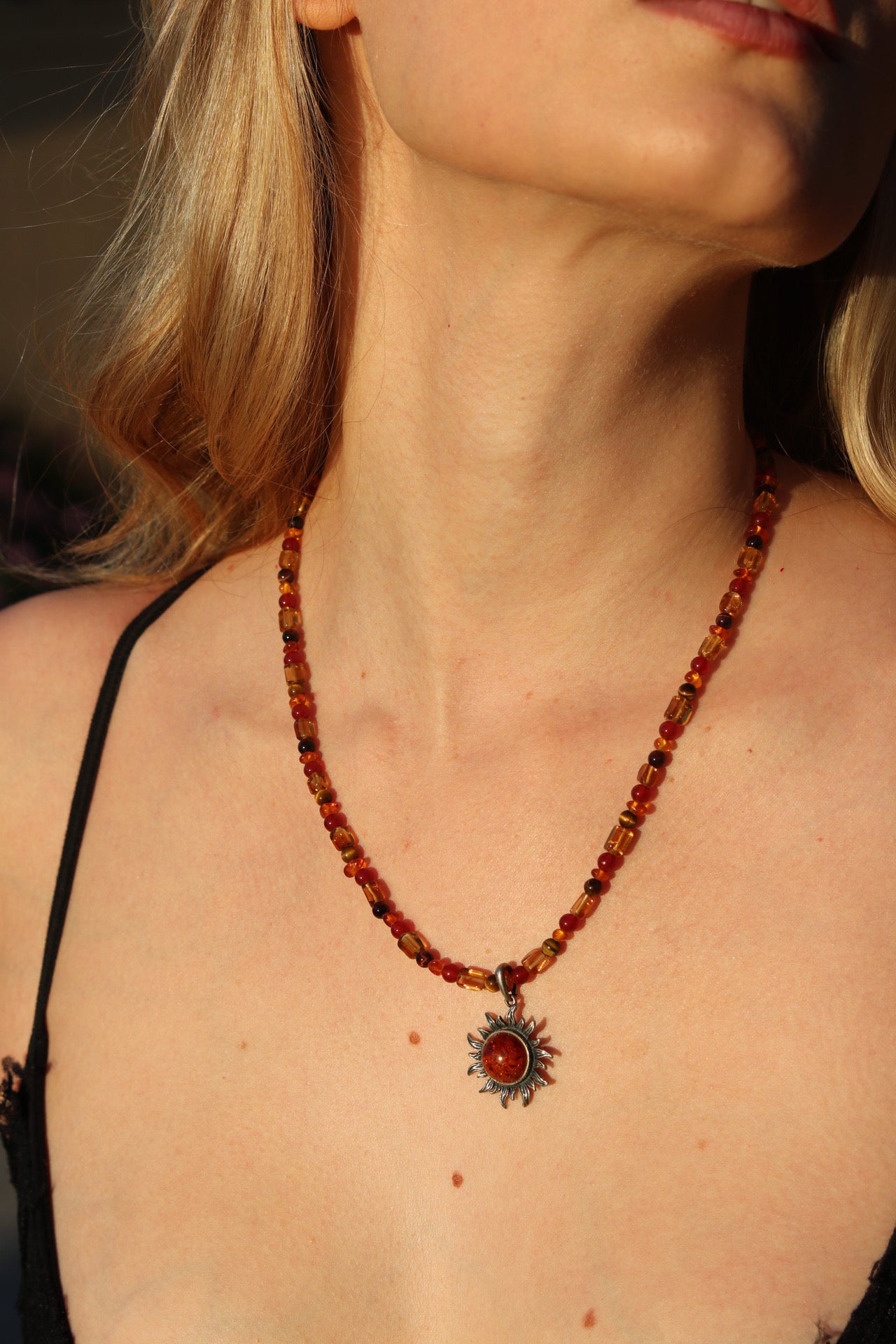 Amber sun pendant necklace