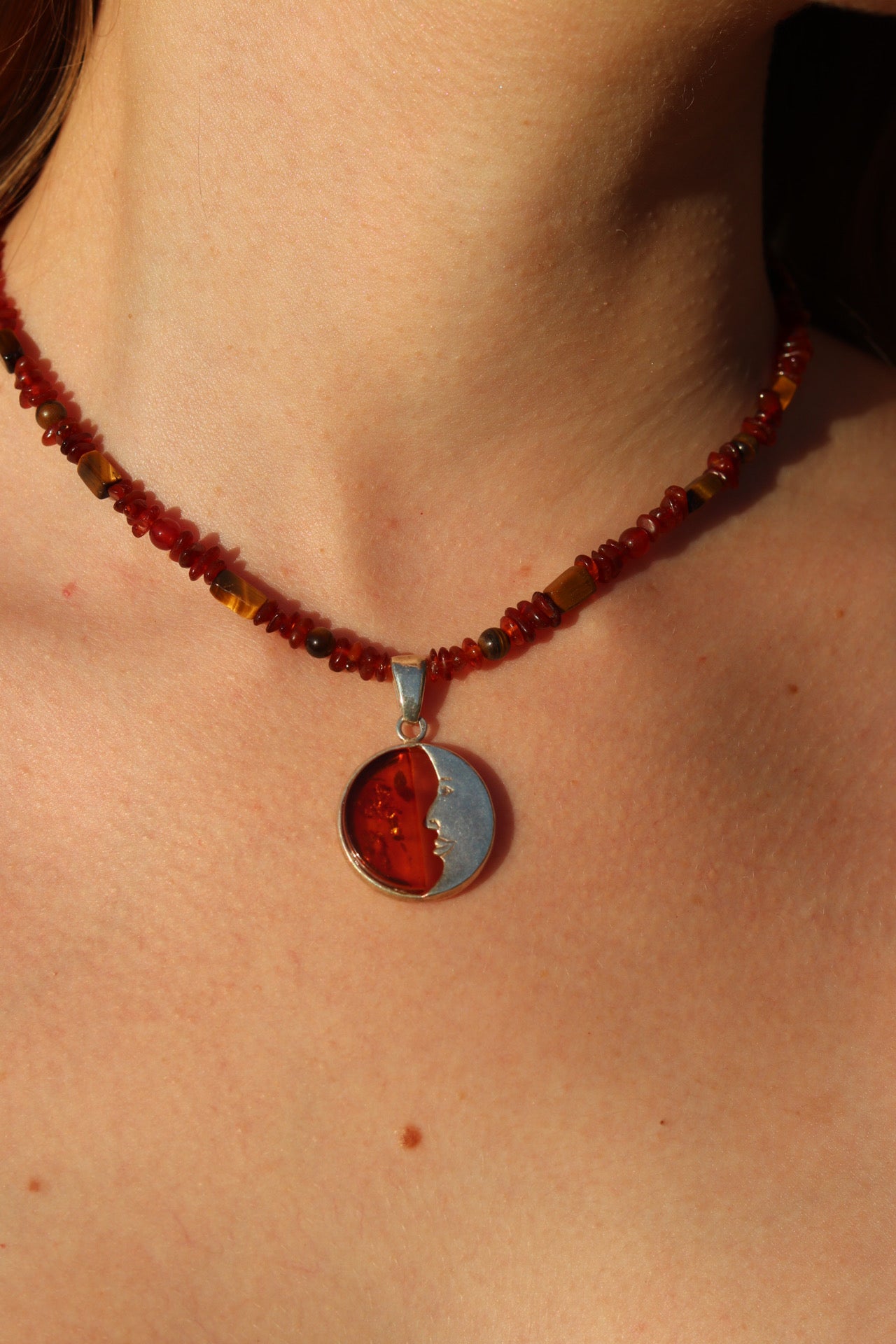 Amber crescent moon pendant