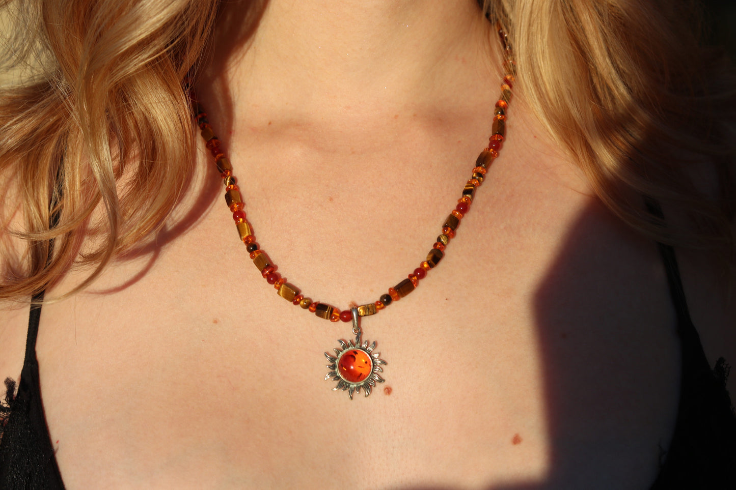 Amber sun pendant necklace