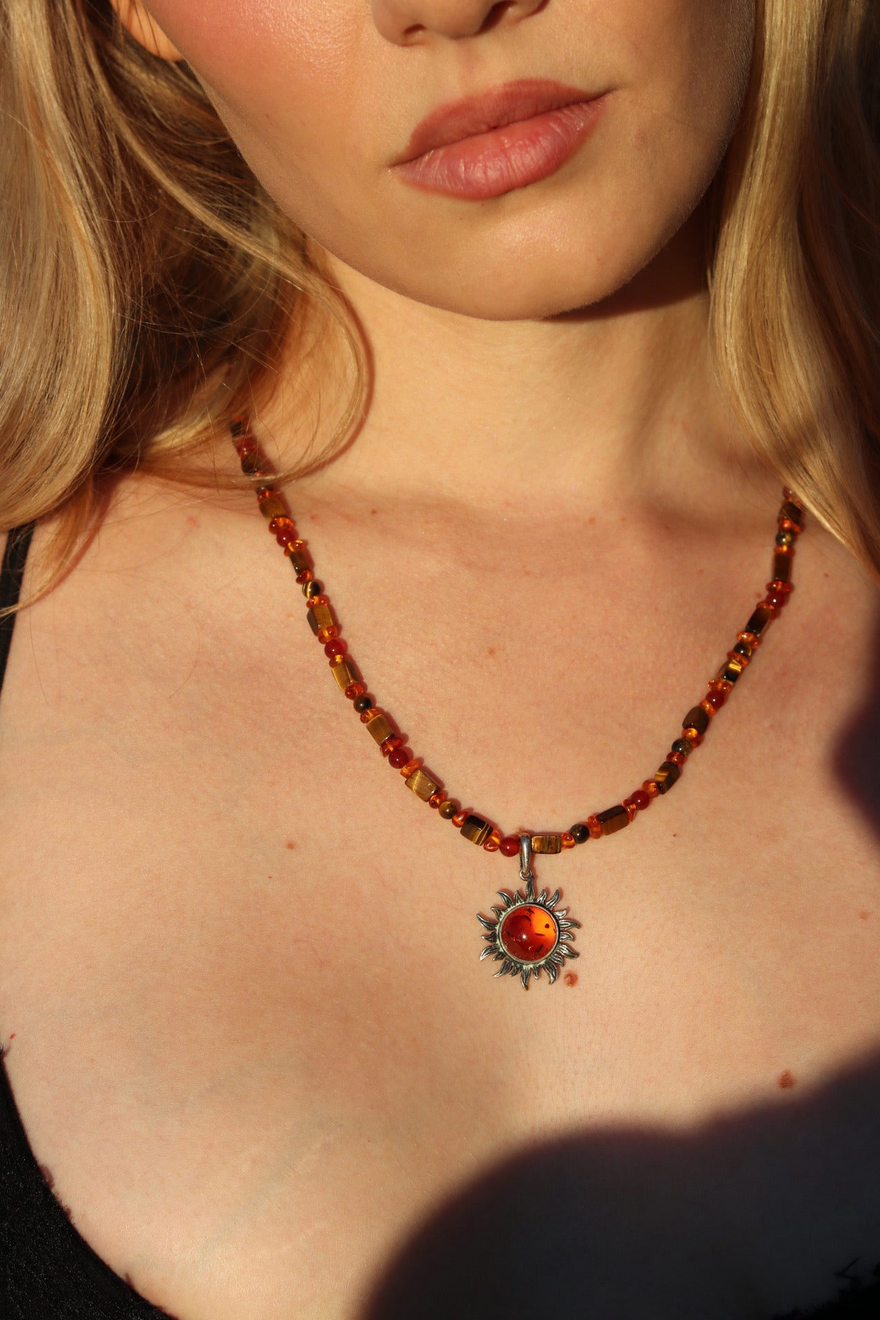 Amber sun pendant necklace