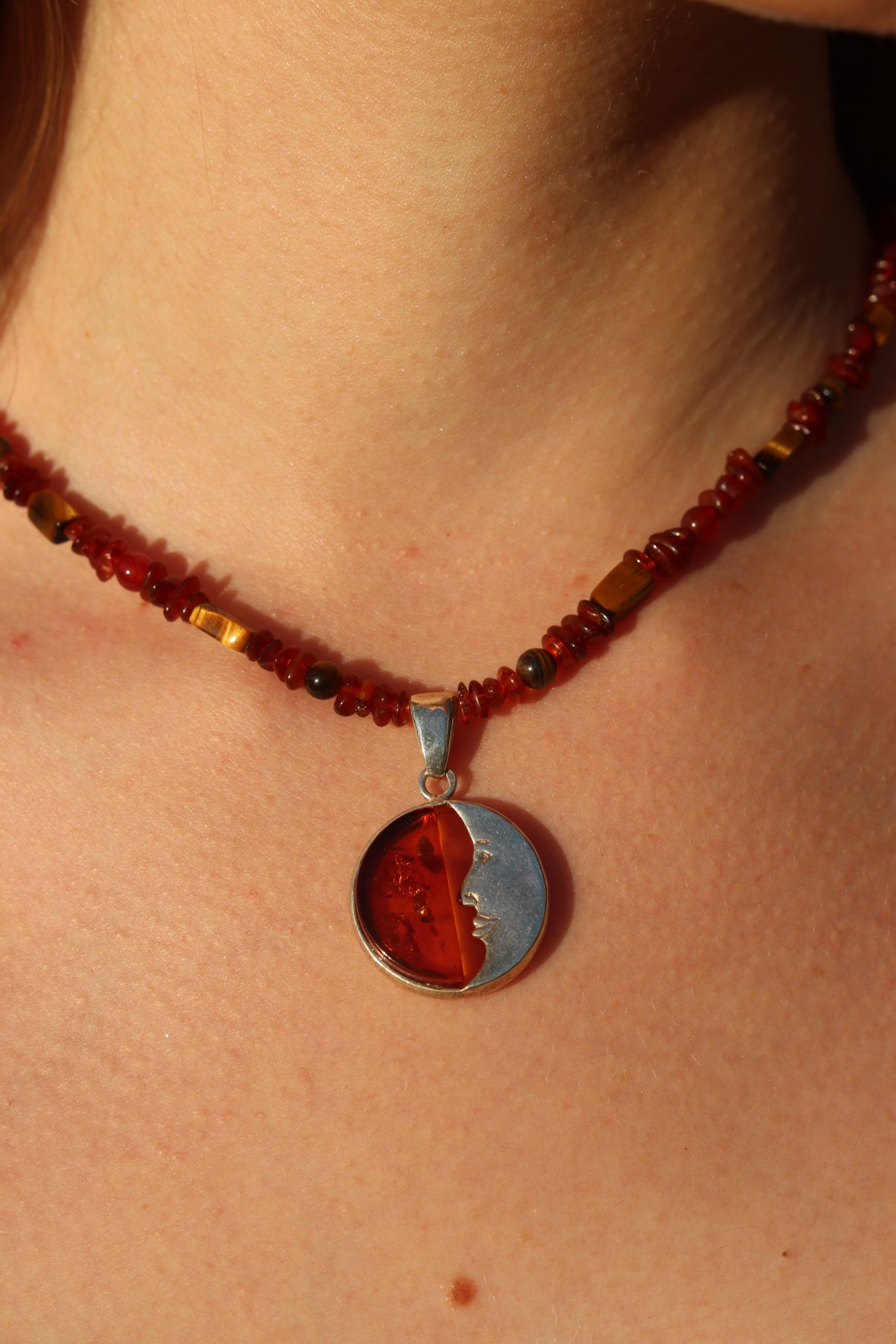 Amber crescent moon pendant