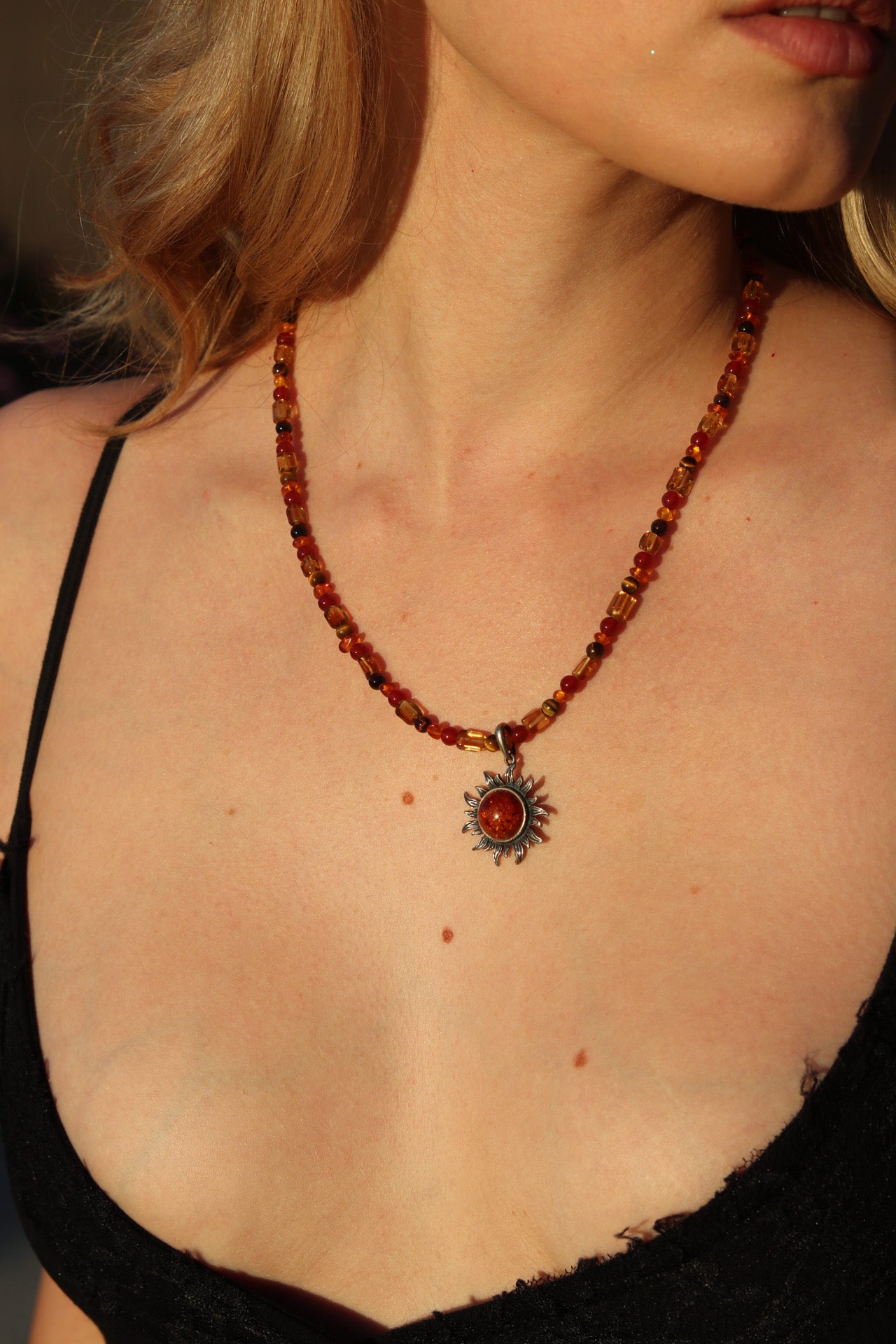 Amber sun pendant necklace