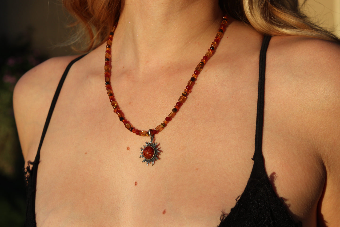 Amber sun pendant necklace