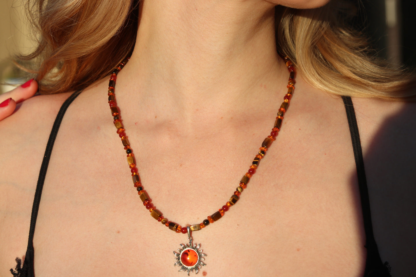 Amber sun pendant necklace