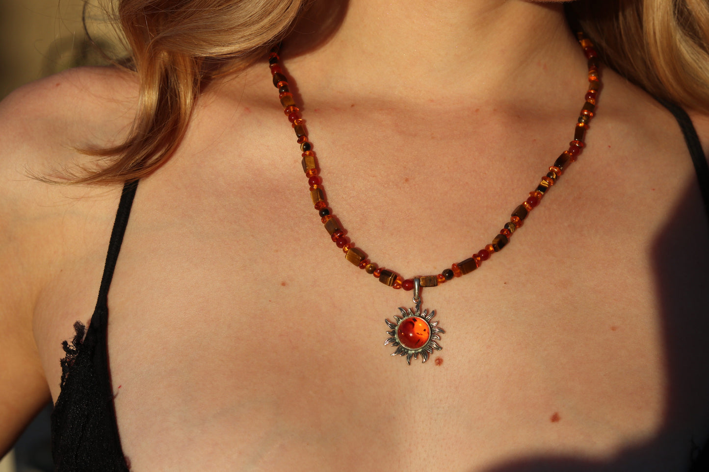 Amber sun pendant necklace