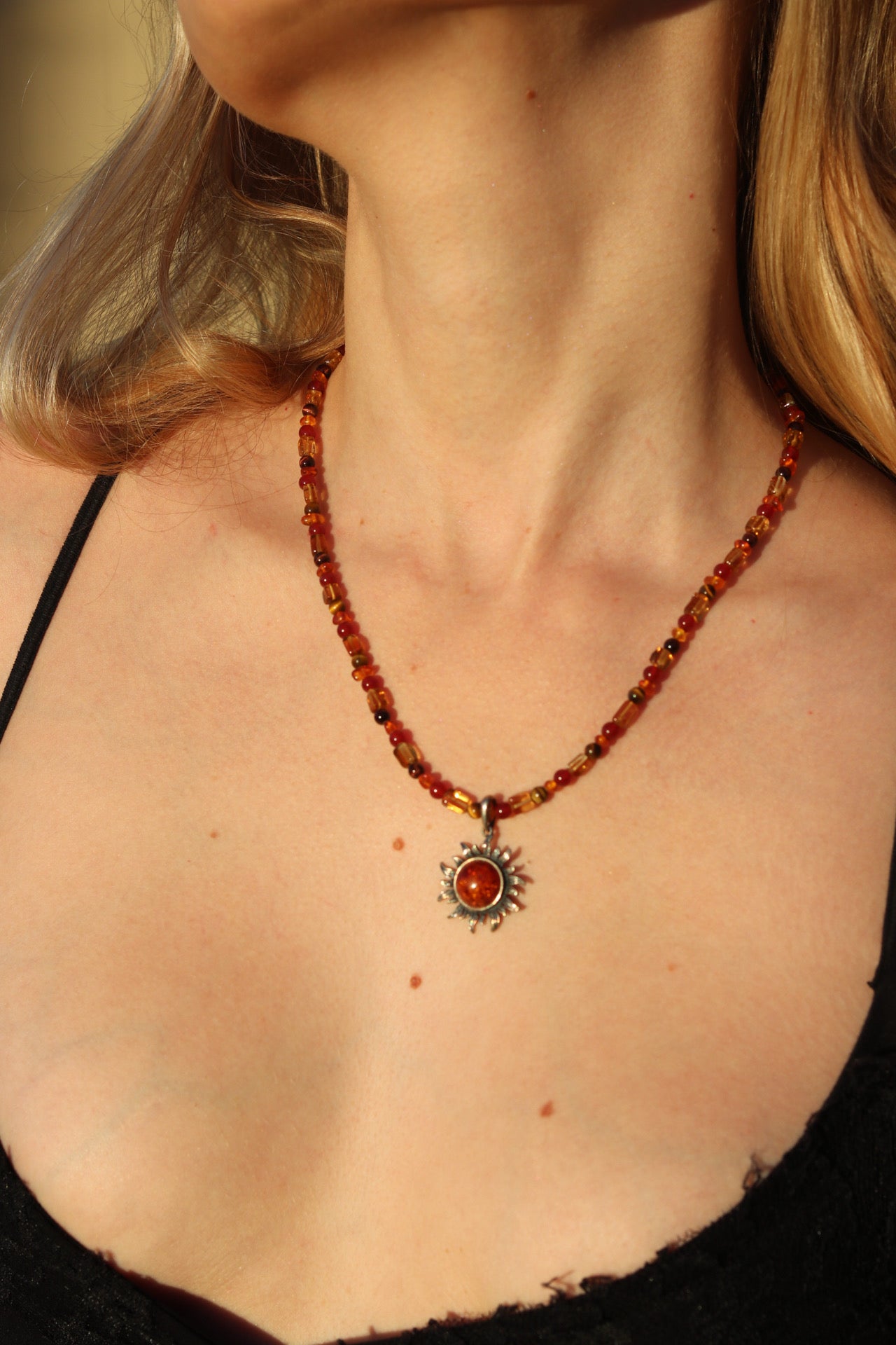 Amber sun pendant necklace