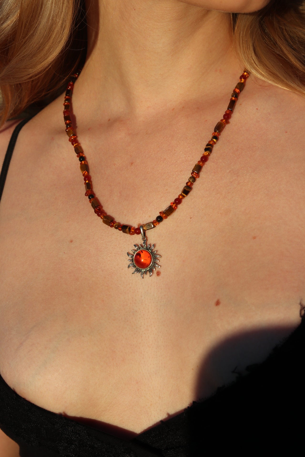 Amber sun pendant necklace